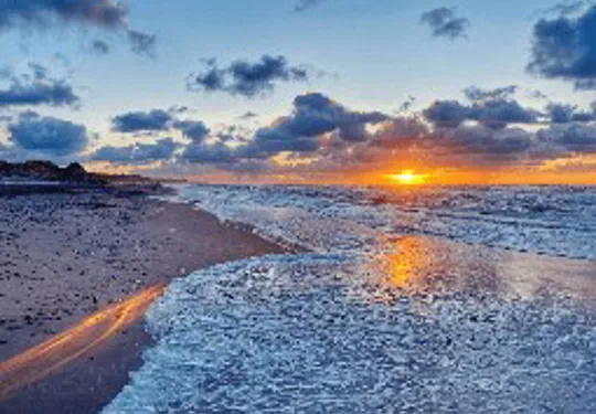 Skagen am Strand bei Sonnenuntergang in Nordjütland