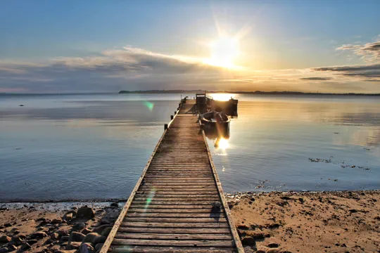 Feriengebiete Ebeltoft Ostsee Dänemark Ebeltoft Sonnenuntergang an Ostsee Dänemark